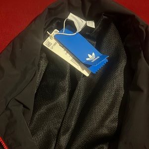 New with tags Adidas RARE windbreaker!!